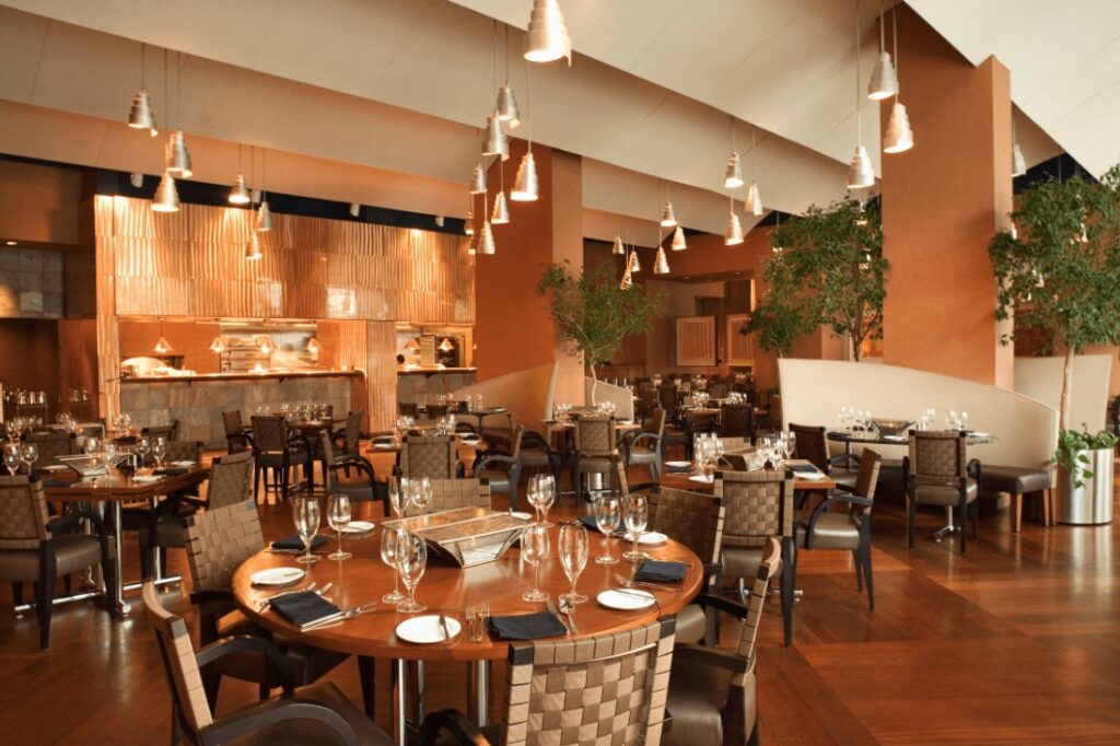 Restaurant with hanging lights and custom ceiling and wall architecture - Idaho Falls Commercial Construction Apollo Construction Company Inc.