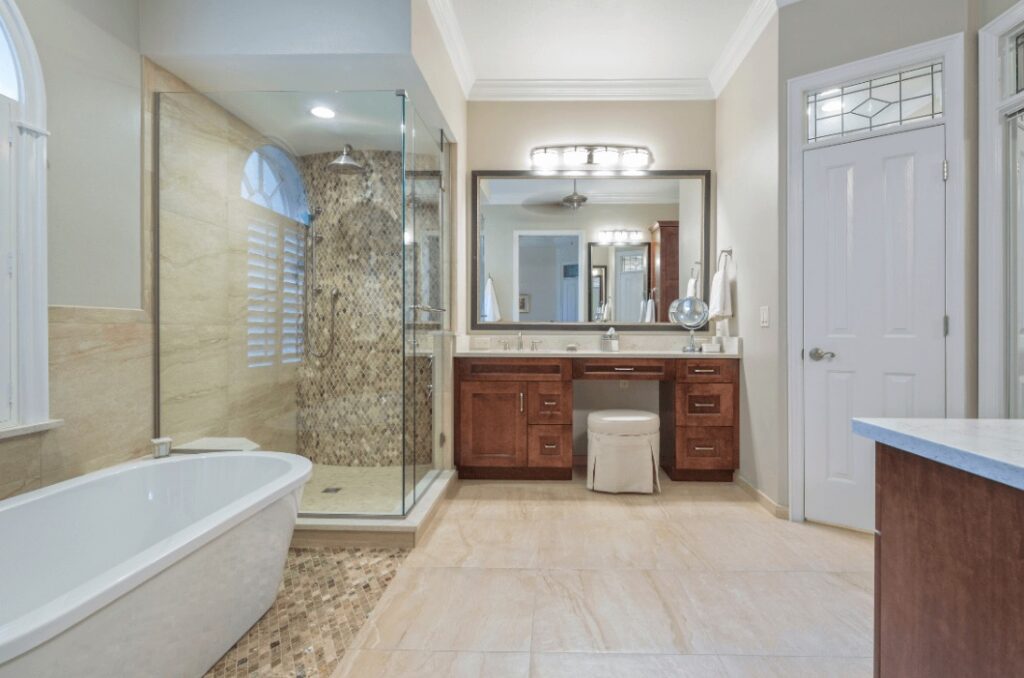 Bathroom with large stand alone tub and glass shower surround after a bathroom remodel by Idaho Falls Residential Construction Apollo Construction Company Inc.